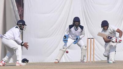 Players of Punjab and Chandigarh in action during a Ranji match at Maharaja Yadavindra Singh Punjab Cricket Association Stadium in Mullanpur on Friday. (Ravi Kumar/HT)