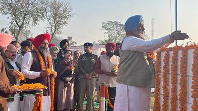 Punjab health and family welfare minister Chetan Singh Jouramajra paying tribute to eight soldiers during the Sena Fateh Diwas event at Begowal village. (HT File)