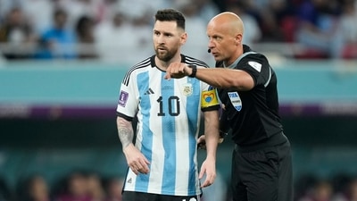 Referee Szymon Marciniak gestures as he speaks with Argentina's Lionel Messi during the World Cup (AP) Referee Szymon Marciniak gestures as he speaks with Argentina's Lionel Messi during the World Cup (AP)