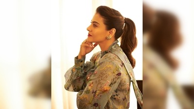 Kajol tied a mid-high ponytail with a soft side brushed puff. She opted for minimal face makeup with bold red lips. (Instagram/@kajol) Kajol tied a mid-high ponytail with a soft side brushed puff. She opted for minimal face makeup with bold red lips. (Instagram/@kajol)
