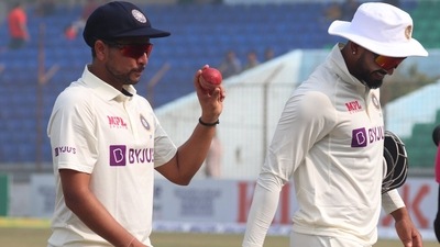 Kuldeep Yadav walks back with ball in hand after registering the best figures by an Indian in Bangladesh (Twitter/@debasissen)