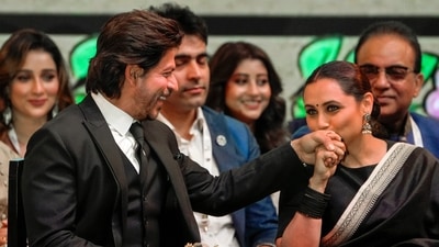 Shah Rukh Khan and Rani Mukerji share a sweet moment at Kolkata International Film Festival. (PTI) Shah Rukh Khan and Rani Mukerji share a sweet moment at Kolkata International Film Festival. (PTI)