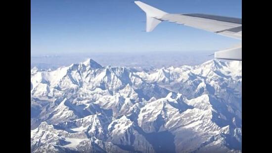 Within 10 minutes of take-off, the mountains appeared, and stayed in view until the plane banked left around Siliguri to turn towards its destination