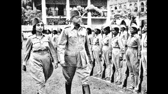 Captain Lakshmi Sahgal and Subhash Chandra Bose inspecting the Rani of Jhansi Regiment of the INA in the early 1940s. (HT Photo)