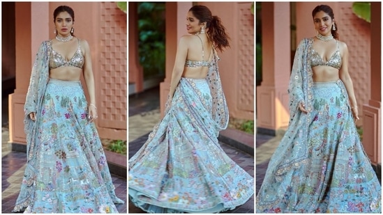 Bhumi Pednekar: The Badhaai Do actor recently set major bridesmaid goals in this gorgeous modern lehenga which features a strappy plunging neckline shimmery blouse and a blue floral lehenga and dupatta.&nbsp;(Instagram/@bhumipednekar)