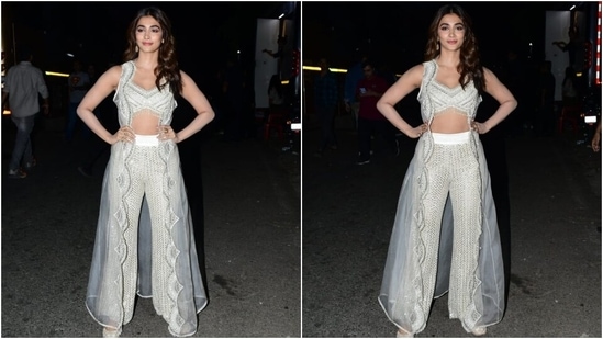 Pooja accessorised the embellished ivory outfit with minimal accessories, including embroidered white juttis, statement rings, and dangling earrings.(Instagram)