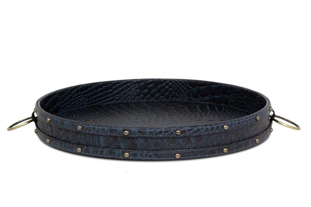 This versatile, very manly, country inspired, grey leather tray can be placed either on the coffee table or dresser to keep your drinks, snacks, or collection of fragrances. (Round genuine croco leather tray by Three Sixty).