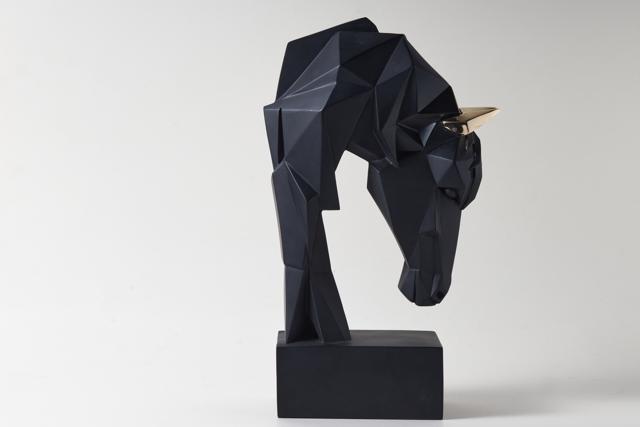 This stunning geometric horse, which has been crafted in fibre will certainly add a powerful and masculine feel to your coffee table or desk. (Geo Horse sculpture in black & gold by htohshop)
