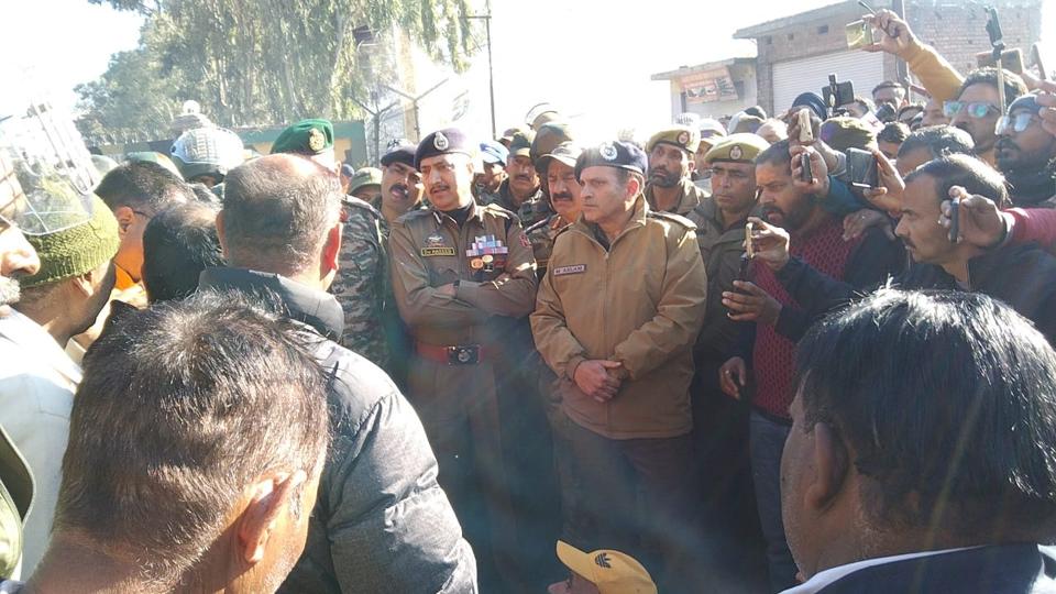 Senior Rajouri police officers rushed to the spot after protests by angry local residents who demanded a fair probe into the death of 2 men Senior Rajouri police officers rushed to the spot after protests by angry local residents who demanded a fair probe into the death of 2 men