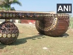The image shows the huge 'Rudra Veena' created by artists in Bhopal from trash.