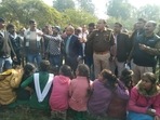 Rescued school students from the bus.(HT photo) Rescued school students from the bus.(HT photo)