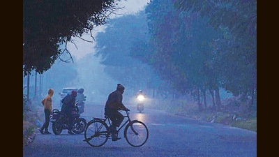 A cyclist on his way amid fog in Chandigarh on Saturday. (Ravi Kumar/HT) A cyclist on his way amid fog in Chandigarh on Saturday. (Ravi Kumar/HT)