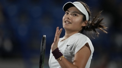 Emma Raducanu of Britain, reacts against Ons Jabeur of Tunisia, during a match of the Mubadala World Tennis Championship in Abu Dhabi, United Arab Emirates, Friday, Dec. 16, 2022. (AP Photo/Kamran Jebreili) (AP)