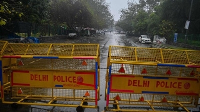 A Delhi police barrier. (Photo by Prakash SINGH/AFP) A Delhi police barrier. (Photo by Prakash SINGH/AFP)