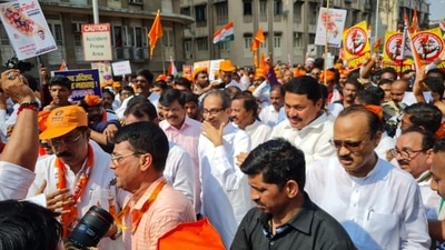 Shiv Sena (UBT) chief Uddhav Thackeray joined the Maha Vikas Aghadi (MVA)-organised "Halla Bol" protest march in Mumbai. (HT Photo) Shiv Sena (UBT) chief Uddhav Thackeray joined the Maha Vikas Aghadi (MVA)-organised "Halla Bol" protest march in Mumbai. (HT Photo)