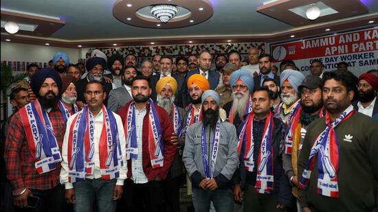 Jammu and Kashmir Apni Party president Altaf Bukhari poses with party leaders and workers during a convention in Samba on Saturday. In November, Bukhari had taken out a massive show of strength in which thousands of workers turned up. (ANI)