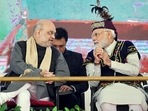 Prime Minister Narendra Modi interacts with Union Home Minister Amit Shah at the Golden Jubilee celebrations of the North Eastern Council (NEC), in Shillong. 
