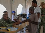 Haiti: A man registers at a makeshift hospital on dock in Jeremie, Haiti.(AP)