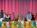 Prime Minister Narendra Modi lays foundation stone of developmental projects as Tripura chief minister Manik Saha and others look on during a public rally in Agartala on Sunday.(PTI) Prime Minister Narendra Modi lays foundation stone of developmental projects as Tripura chief minister Manik Saha and others look on during a public rally in Agartala on Sunday.(PTI)
