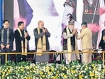 Prime Minister Narendra Modi and Union home minister Amit Shah at the golden jubilee celebrations of the North Eastern Council in Shillong on Sunday. (PTI) Prime Minister Narendra Modi and Union home minister Amit Shah at the golden jubilee celebrations of the North Eastern Council in Shillong on Sunday. (PTI)