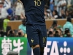 Kylian Mbappe celebrates scoring their third goal to complete his hat-trick 