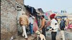 Police personnel along with a sniffer dog inspect the house of the accused identified as Dildar Ansari who allegedly killed his wife, in Sahibganj on Sunday. (Agencies)