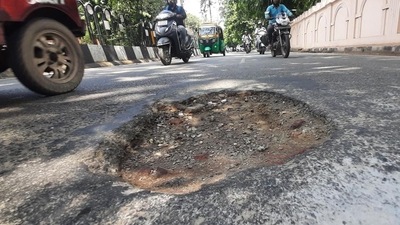 Potholes on Bengaluru roads. Potholes on Bengaluru roads.