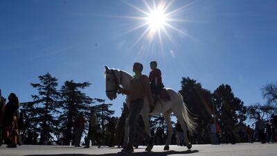 A tourist enjoying a horseride amid scattered crowd on The Ridge, Shimla, Himachal Pradesh. (Deepak Sansta/HT) A tourist enjoying a horseride amid scattered crowd on The Ridge, Shimla, Himachal Pradesh. (Deepak Sansta/HT)