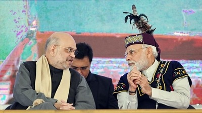 Prime Minister Narendra Modi interacts with Union Home Minister Amit Shah at the Golden Jubilee celebrations of the North Eastern Council (NEC), in Shillong. (ANI) Prime Minister Narendra Modi interacts with Union Home Minister Amit Shah at the Golden Jubilee celebrations of the North Eastern Council (NEC), in Shillong. (ANI)