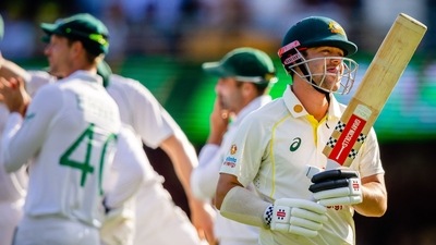 Australia's Travis Head walks off after being dismissed by South Africa's Kagiso Rabada during the second day of the first cricket Test match between Australia and South Africa at the Gabba, in Brisbane on December 18, 2022. (AFP) Australia's Travis Head walks off after being dismissed by South Africa's Kagiso Rabada during the second day of the first cricket Test match between Australia and South Africa at the Gabba, in Brisbane on December 18, 2022. (AFP)