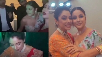 Actors Rupali Ganguly and Shehnaaz Gill take to the dance floor at a recent wedding.