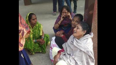 Families of victims at Masrakh village in Saran district. (HT Photo) Families of victims at Masrakh village in Saran district. (HT Photo)