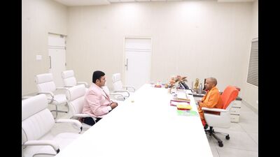 Generic Aadhaar founder Arjun Deshpande with Uttar Pradesh chief minister Yogi Adityanath. (Sourced)