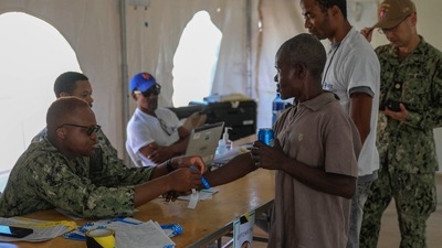 Haiti: A man registers at a makeshift hospital on dock in Jeremie, Haiti. (AP) Haiti: A man registers at a makeshift hospital on dock in Jeremie, Haiti. (AP)