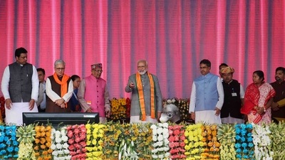 Prime Minister Narendra Modi lays foundation stone of developmental projects as Tripura chief minister Manik Saha and others look on during a public rally in Agartala on Sunday. (PTI) Prime Minister Narendra Modi lays foundation stone of developmental projects as Tripura chief minister Manik Saha and others look on during a public rally in Agartala on Sunday. (PTI)
