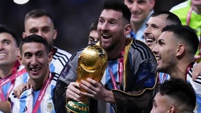 Argentina's Lionel Messi and teammates celebrate with the World Cup trophy after Argentina defeated France in the World Cup final 2022 (AP) Argentina's Lionel Messi and teammates celebrate with the World Cup trophy after Argentina defeated France in the World Cup final 2022 (AP)