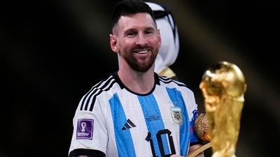 Argentina's Lionel Messi looks at the trophy after winning the World Cup final 2022 (AP) Argentina's Lionel Messi looks at the trophy after winning the World Cup final 2022 (AP)