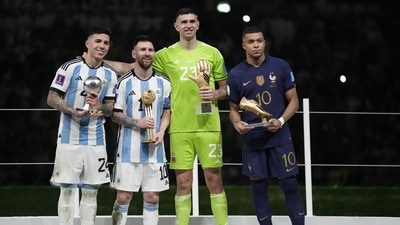 Argentina's Enzo Fernandez, goalkeeper Emiliano Martinez, Lionel Messi and France's Kylian Mbappe, from left to right, pose with their individual awards (AP) Argentina's Enzo Fernandez, goalkeeper Emiliano Martinez, Lionel Messi and France's Kylian Mbappe, from left to right, pose with their individual awards (AP)