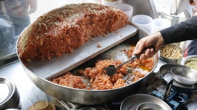 Gajar ka Halwa: Gajar ka halwa is the queen of winter sweets that certainly needs no introduction. Every north Indian watches for November when this dish of ghee and sugar-coated carrots is served. Nothing could be more enjoyable than devouring a bowl of warm pistachio-topped halwa. (Dhruv Sethi/HT) Gajar ka Halwa: Gajar ka halwa is the queen of winter sweets that certainly needs no introduction. Every north Indian watches for November when this dish of ghee and sugar-coated carrots is served. Nothing could be more enjoyable than devouring a bowl of warm pistachio-topped halwa. (Dhruv Sethi/HT)