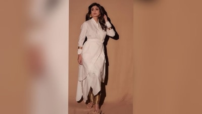 Lastly, Shilpa chose black winged eyeliner, kohled eyes, nude pink eye shadow, darkened brows, berry-toned lip shade, blushed cheeks, glowing skin, contoured face, and mascara on the lashes for the glam picks. She kept her tresses open in soft curls with a side part as she posed for the pictures. (Instagram/@theshilpashetty)