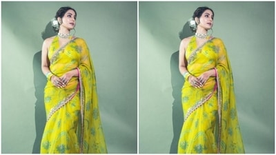 Hina further accessorised her look with a statement silver neck choker, silver ear studs with emerald stone details, and yellow and blue bangles. (Instagram/@realhinakhan) Hina further accessorised her look with a statement silver neck choker, silver ear studs with emerald stone details, and yellow and blue bangles. (Instagram/@realhinakhan)