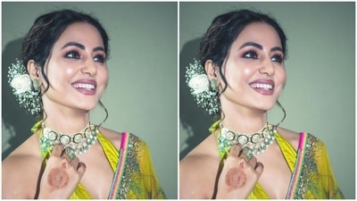 Hina further teamed her saree with a matching blouse that came with halter neck details and similar patterns and backless details, with a knot detail at the back of the neck. (Instagram/@realhinakhan) Hina further teamed her saree with a matching blouse that came with halter neck details and similar patterns and backless details, with a knot detail at the back of the neck. (Instagram/@realhinakhan)