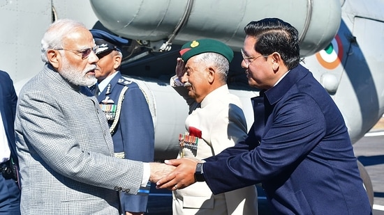 PM Modi welcomed by Meghalaya Chief Minister Conrad Sangma in the presence of Governor Brig. BD Mishra (Retd.) upon his arrival in Shillong.(Conrad Sangma Twitter)