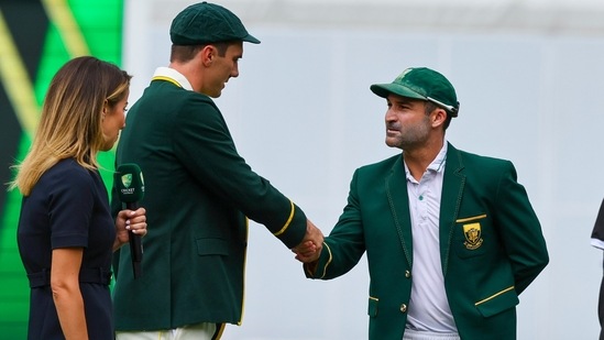 Pat Cummins shakes hands with Dean Elgar (AP)