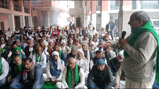 BKU (Tikait) state president Ratan Mann addressing farmers at a kisan panchayat in Panipat on Sunday. (HT Photo)