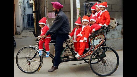 Little Santas off to school. (HT)