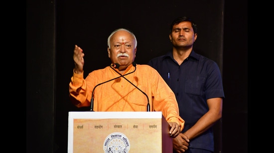 Mumbai, India - December 18, 2022: Rashtriya Swayamsevak Sangh (RSS) Sarsanghchalak Mohan Bhagwat, along with Kumar Mangalam Birla, Chairman of Aditya Birla Group during the grand celebration of Dr. Suraj Prakash Birth Centenary closing ceremony, organised by Bharat Vikas Parishad (Konkan Prant), at Birla Matushri Hall, Marine Lines, in Mumbai, India, on December 18, 2022. (Photo by Bhushan Koyande/HT Photo) (HT PHOTO)