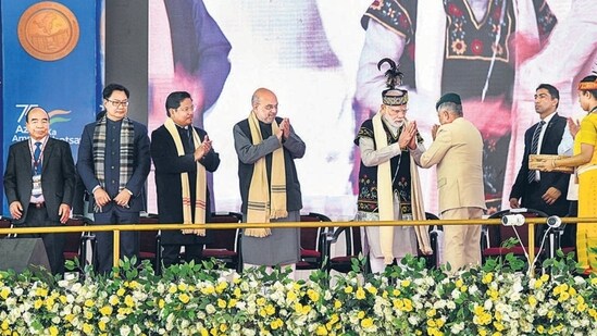 Prime Minister Narendra Modi and Union home minister Amit Shah at the golden jubilee celebrations of the North Eastern Council in Shillong on Sunday. (PTI)