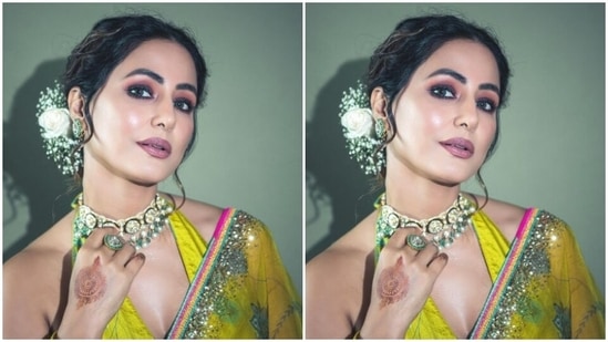 Styled by fashion stylist Sunakshi Kansal Rathod, Hina wore her tresses into a messy bun and added a white flower to her bun.&nbsp;(Instagram/@realhinakhan)