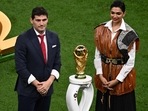 Former Spanish footballer and World Cup winner Iker Casillas and actor Deepika Padukone stand next to the World Cup Trophy before the start of the Qatar 2022 World Cup final on Sunday. (Photo by Jewel SAMAD / AFP)(AFP) Former Spanish footballer and World Cup winner Iker Casillas and actor Deepika Padukone stand next to the World Cup Trophy before the start of the Qatar 2022 World Cup final on Sunday. (Photo by Jewel SAMAD / AFP)(AFP)